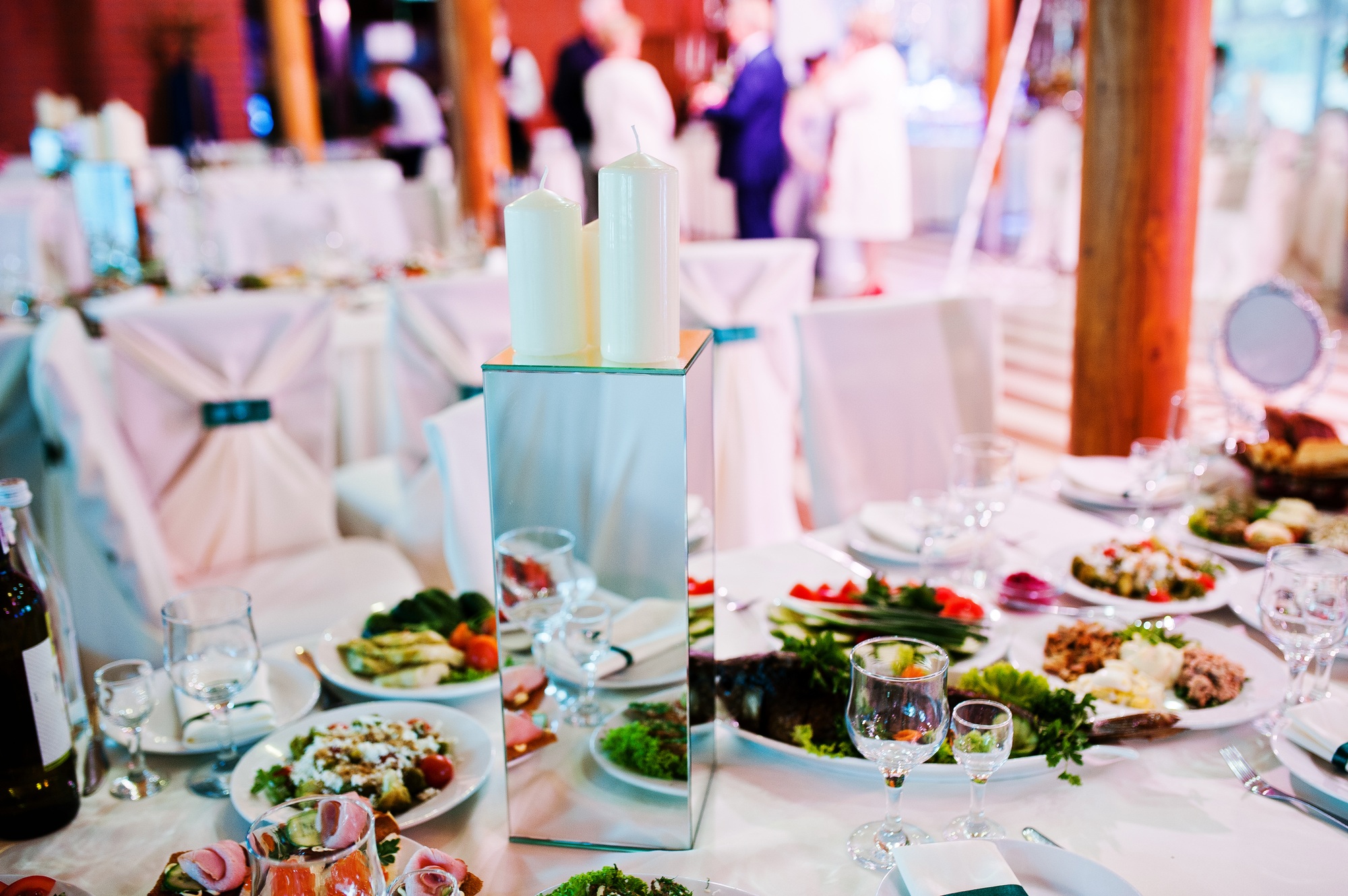 Decoration on table on wedding party, mirror and candles